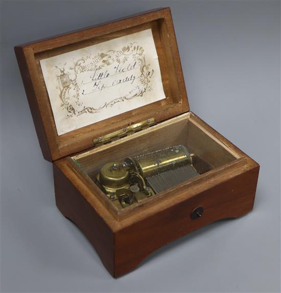 A Swiss walnut cased musical box, playing two airs